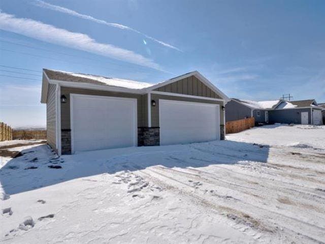 ranch-style home with a garage