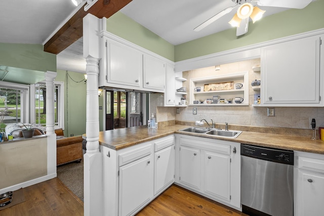 kitchen featuring ceiling fan, sink, dishwasher, and hardwood / wood-style floors