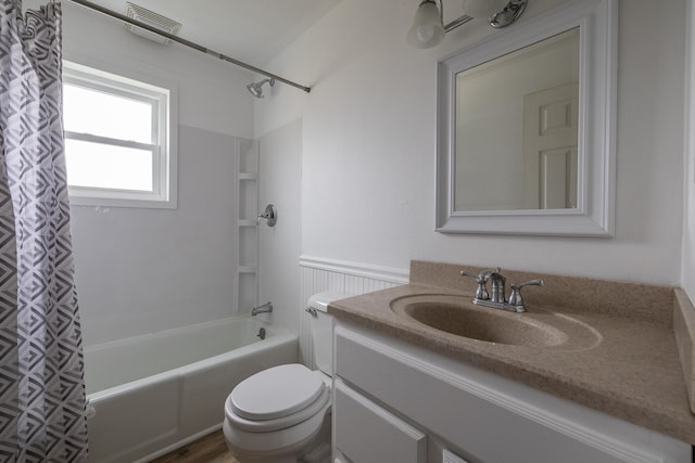 full bathroom with toilet, shower / bath combo with shower curtain, and large vanity