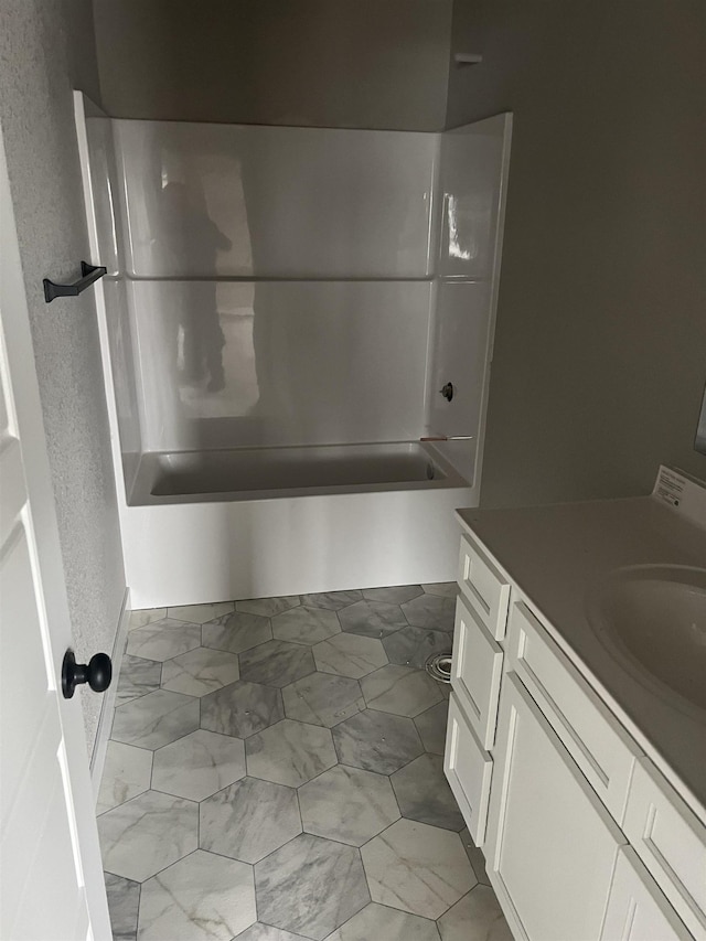 bathroom with vanity and shower / bath combination