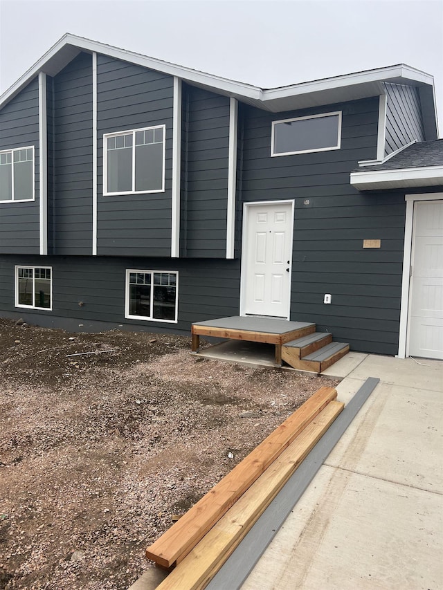 view of exterior entry featuring a garage