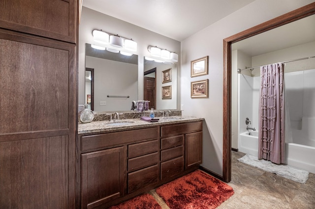 bathroom featuring vanity and shower / bath combination with curtain