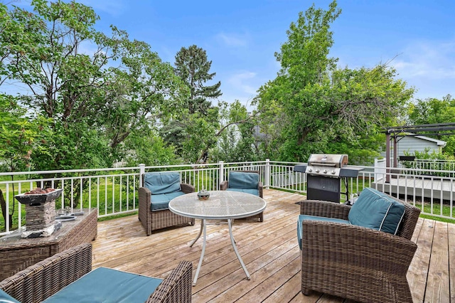 wooden terrace featuring area for grilling