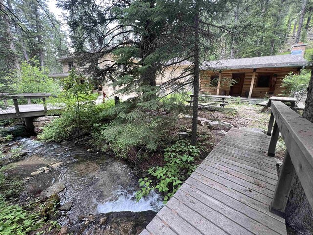 deck featuring a water view