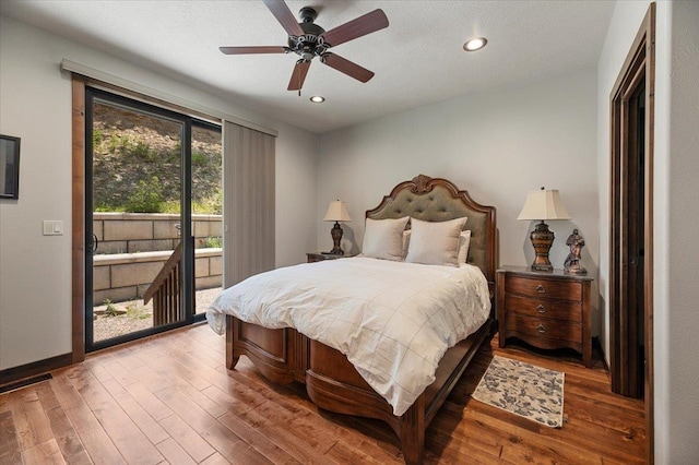 bedroom featuring ceiling fan and hardwood / wood-style floors