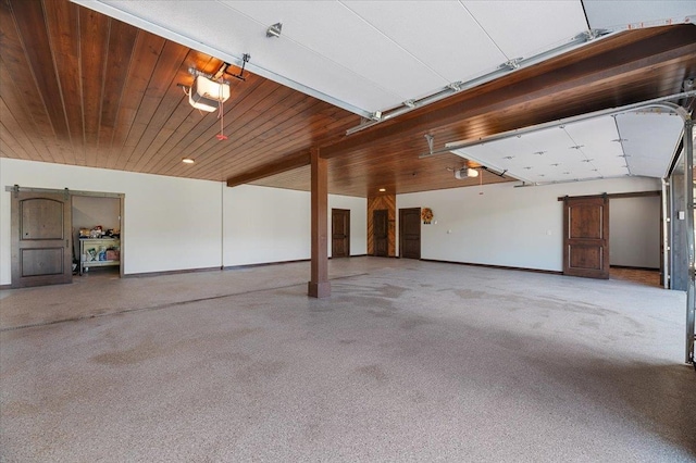 garage with wood ceiling and a garage door opener