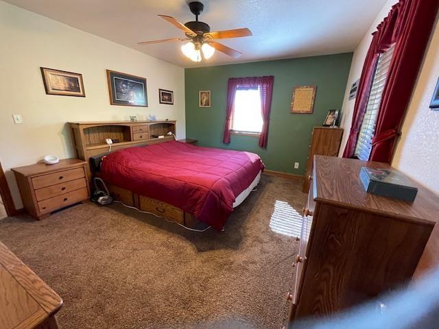 bedroom with carpet flooring and ceiling fan