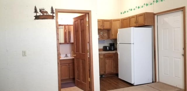 kitchen featuring white refrigerator