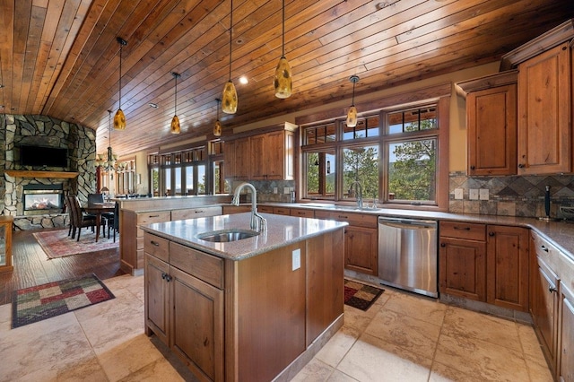 kitchen featuring stainless steel dishwasher, wooden ceiling, sink, vaulted ceiling, and a stone fireplace