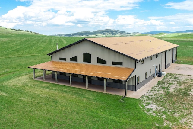 rear view of house with a mountain view