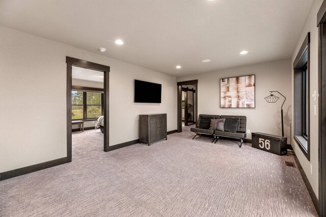 21242 Rubys Way, Lead, SD 57754 - carpeted living room with baseboards, visible vents, and recessed lighting