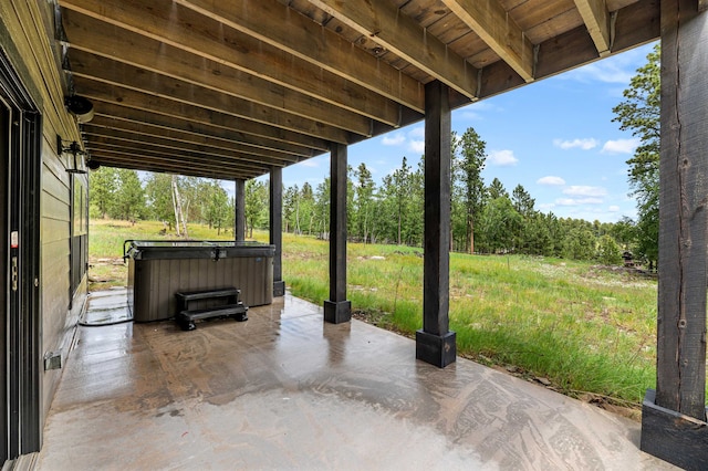 view of patio featuring a hot tub