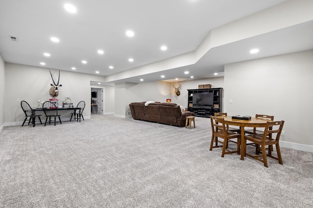 dining room with carpet flooring, recessed lighting, visible vents, and baseboards