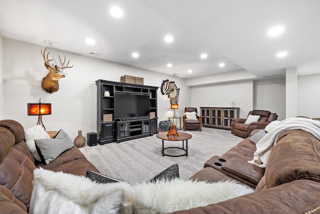 living room featuring recessed lighting, visible vents, and carpet