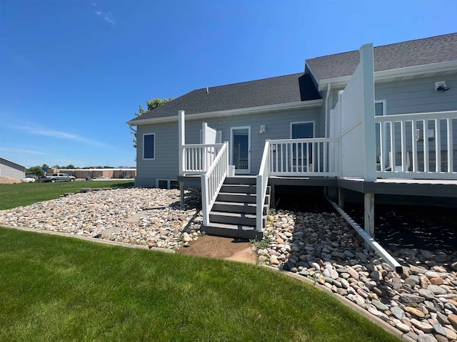 back of house featuring a wooden deck