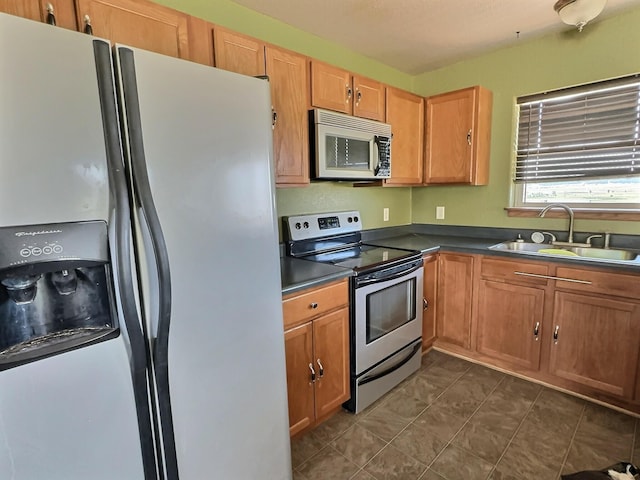 kitchen featuring appliances with stainless steel finishes and sink