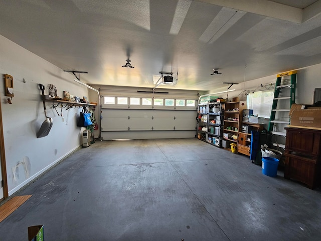 garage featuring a garage door opener