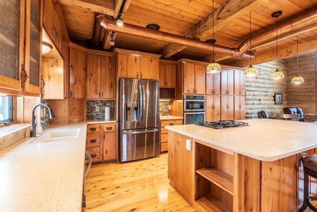 23470 Mineral Ln, Hill City, SD 57745 - kitchen featuring appliances with stainless steel finishes, sink, wooden ceiling, beam ceiling, and light hardwood / wood-style flooring