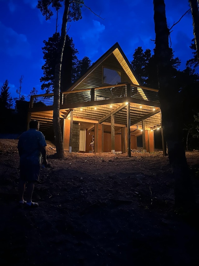 view of back house at night