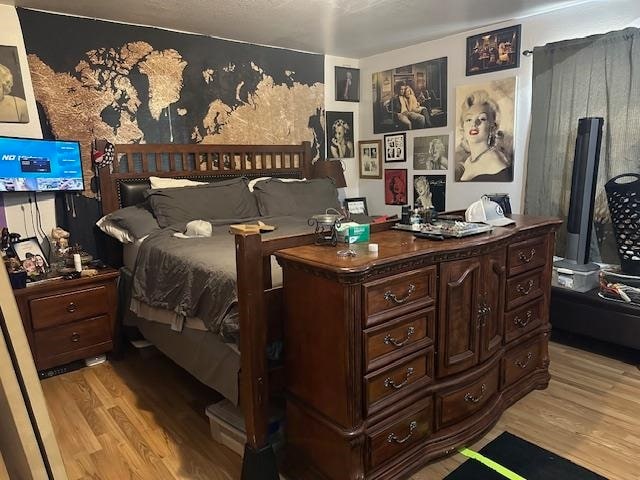 bedroom featuring light hardwood / wood-style floors