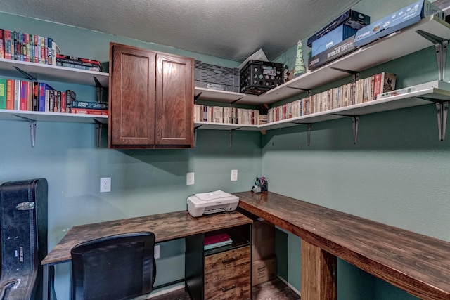 office space featuring a textured ceiling