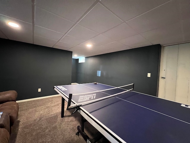 game room with a drop ceiling and carpet