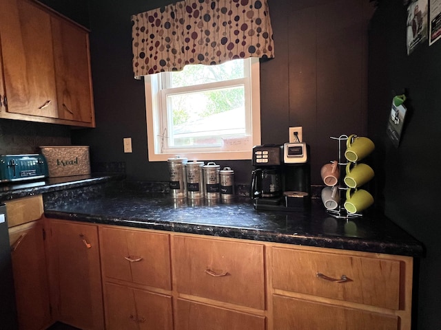 kitchen featuring fridge