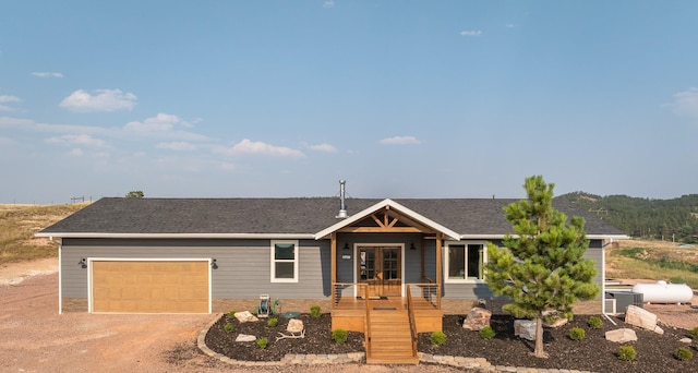 single story home with a garage