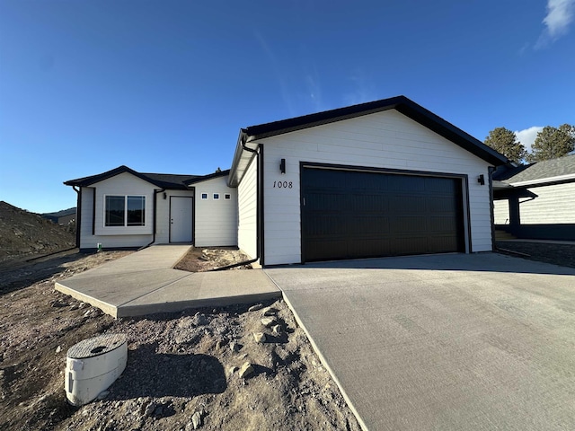 ranch-style home with a garage