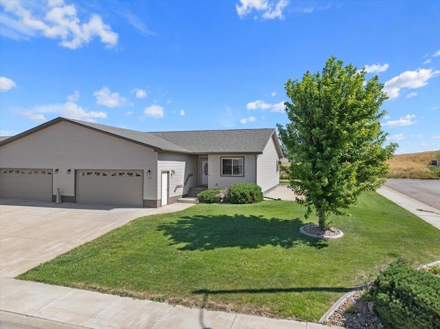 ranch-style house with a garage and a front lawn