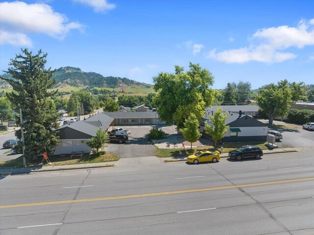 230 N Main St, Spearfish, SD 57783 - aerial view of a mountainous background