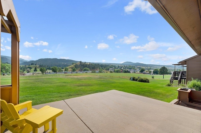 view of patio featuring a mountain view