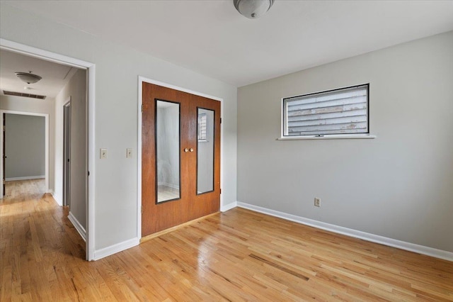 entrance foyer with light hardwood / wood-style flooring