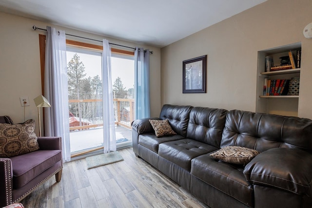 living room featuring light wood-style flooring