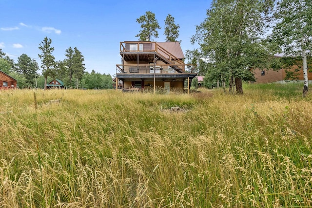 view of yard with a wooden deck