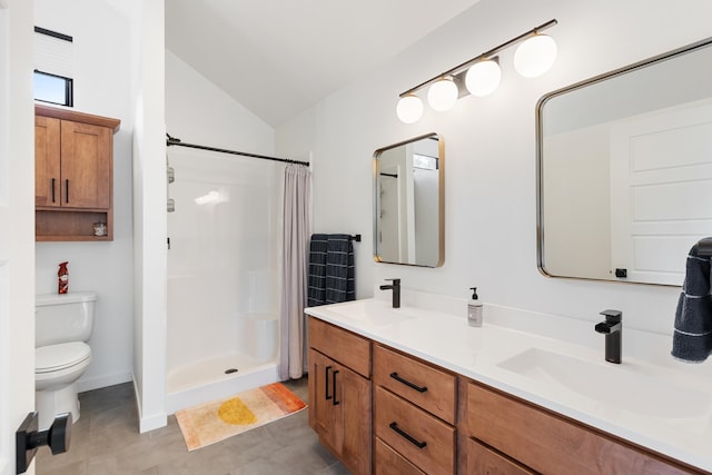 bathroom with dual vanity, vaulted ceiling, tile patterned flooring, toilet, and a shower with curtain