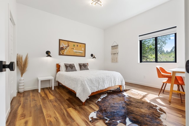 bedroom featuring hardwood / wood-style flooring