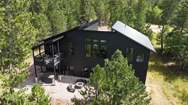 view of side of home featuring a patio