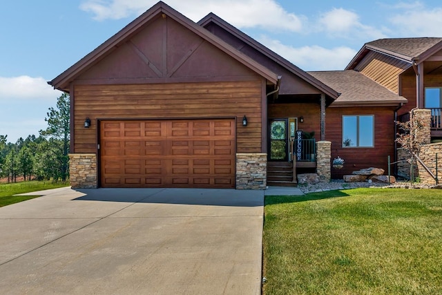 view of front facade featuring a front yard and a garage