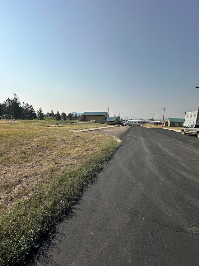 view of street featuring a rural view