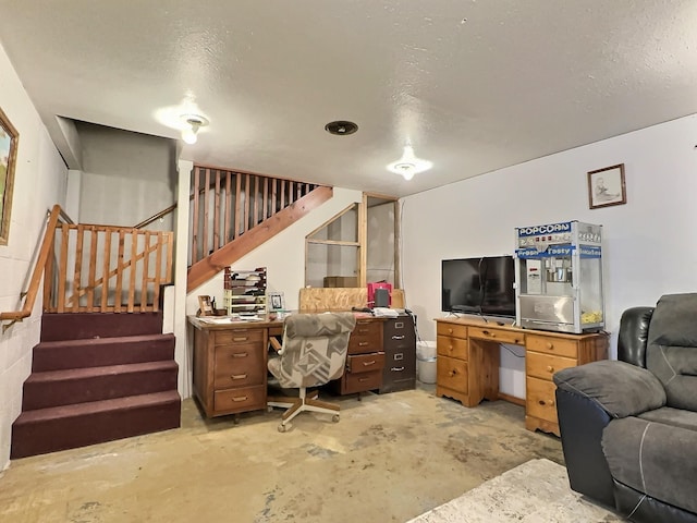 office area with concrete floors