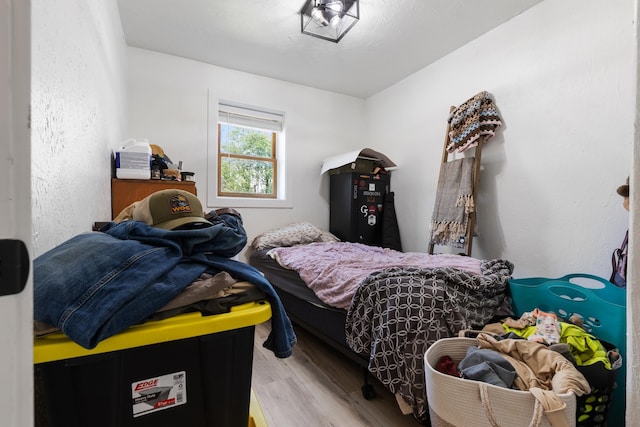 bedroom with light wood-type flooring