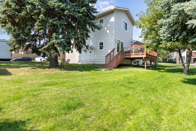 view of yard featuring a wooden deck