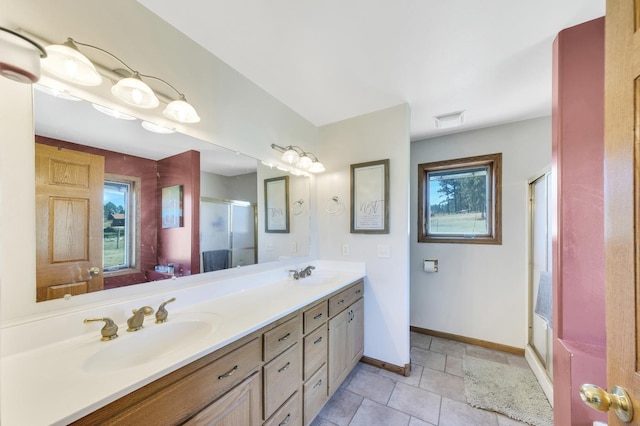 bathroom featuring double vanity, a sink, visible vents, and a shower stall