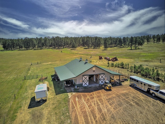 birds eye view of property featuring a rural view