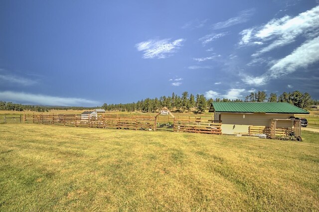 birds eye view of property with a rural view and a mountain view