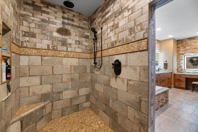 bathroom featuring independent shower and bath and vanity