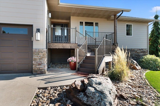 view of front of property with a garage