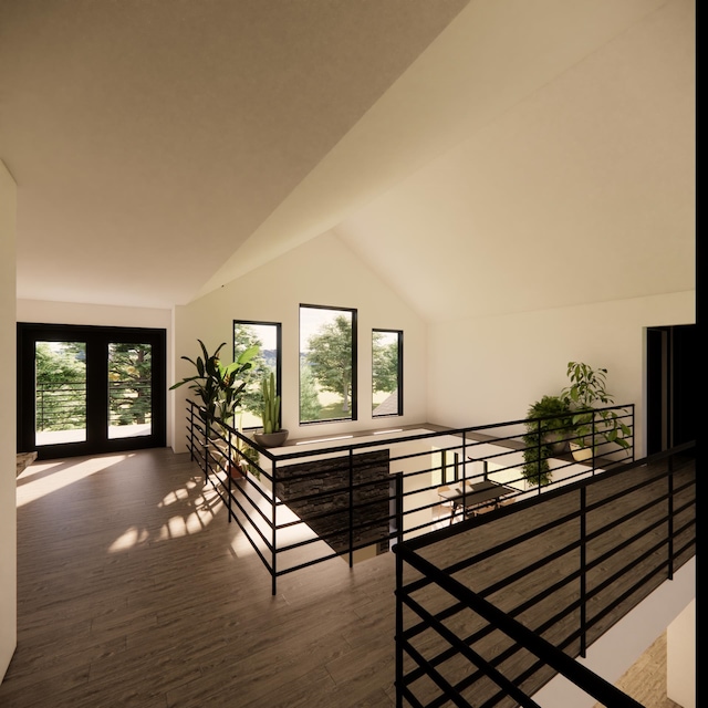 interior space featuring wood-type flooring and vaulted ceiling