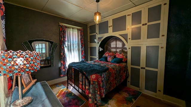 bedroom featuring ornamental molding